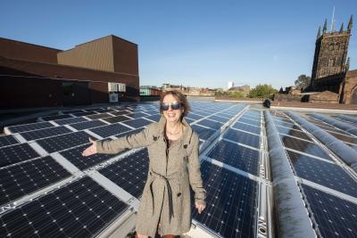 The council’s Member Champion for Climate Change, Councillor Barbara McGarrity, with the solar panels on top of the Civic Centre