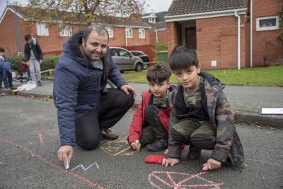 Children can play safely outside their homes