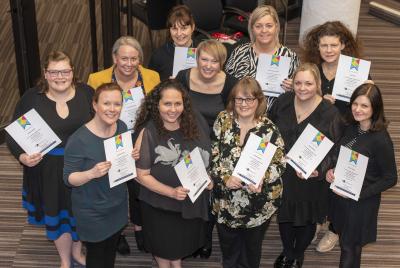 Special Educational Needs and Disabilities Outreach Service Co-ordinator Dr Eve Griffiths, centre, with teachers who have successfully completed the Autism Leaders Award