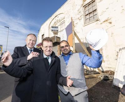 (l:r) Jon Bramwell, chair of the Regional Town Centre Taskforce and a managing director at HSBC Commercial Banking, Mayor of the West Midlands Andy Street and Councillor Harman Banger, cabinet member for city economy at City of Wolverhampton Council outside the derelict Pipe Hall