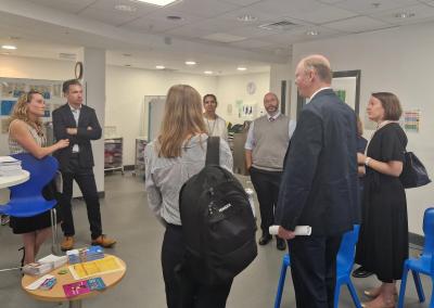 Professor Chris Whitty, England’s Chief Medical Officer, chats to healthcare professionals at the Health Hub in the Mander Centre
