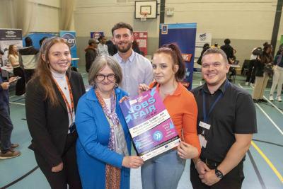 (L-R): Molly Dewsbury, Aldi Trainee Area Manager, Councillor Louise Miles, Cabinet Member for Jobs and Skills, George Davis, Aldi Trainee Area Manager, Nikola Kowalik, job seeker aged 20, and Matt Rownes, Youth Leader at DWP Molineux House, at the city jobs fair