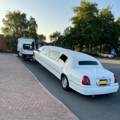 The limousine is towed away