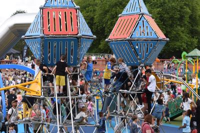 Children and young people enjoying the new play area and splash pad at East Park