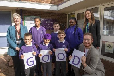 Pupils join Councillor Jacqui Coogan, the City of Wolverhampton Council's Cabinet Member for Education, Skills and Work, Tamsin Davis, Principal, Councillor Christopher Burden, Cabinet Member for Children and Young People, to celebrate St Anthony’s Catholic Primary Academy's Good Ofsted rating
