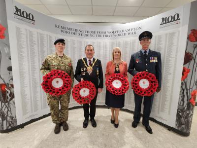 Mayor of Wolverhampton, Councillor Dr Michael Hardacre, Mayoress Ms Lynn Plant, with Sgt Victoria Wilkinson from 210 Battery and Paul Nicholls from the Royal British Legion prepare for Remembrance Sunday