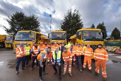 Councillor Craig Collingswood (centre front in yellow vest), cabinet member for environment and climate change, and John Roseblade (second row, far left), director of resident services, thank drivers and staff from the council’s winter service team