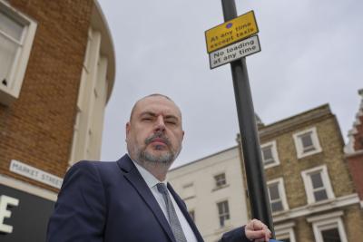 Councillor Craig Collingswood, cabinet member for environment and climate change, alerts drivers to the ‘taxis only’ sign at the rank in Market Street