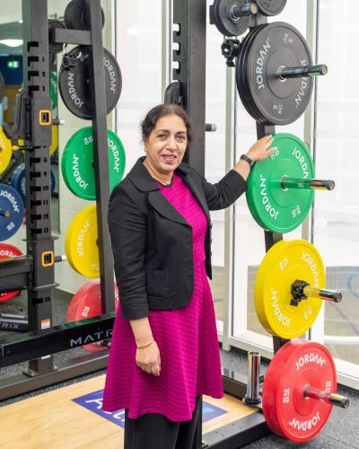 Councillor Jasbir Jaspal, the City of Wolverhampton Council's Cabinet Member for Adults and Wellbeing, with some of the new equipment which has been installed at the council's WV Active leisure centres