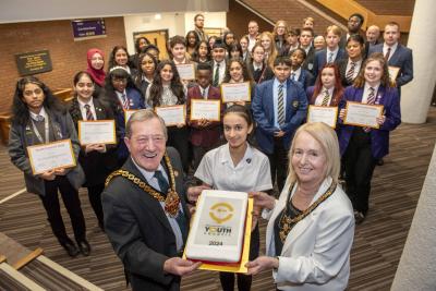 Mayor Councillor Dr Michael Hardacre, Mayoress Lynn Plant and Harleen Nahal, Chair of the Youth Council, with the new youth councillors and council officers