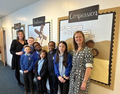 Pupils join Head of School Lauren Smith and Assistant Headteacher Sonja Brookbanks to celebrate St Martin’s Church of England Primary Academy’s successful Statutory Inspection of Anglican and Methodist Schools (SIAMS) outcome