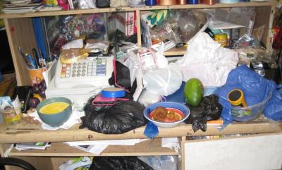Cluttered storage space at Etin-Osa Afro-Caribbean Food, formerly AJM Foods