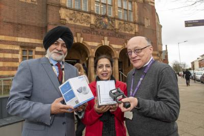 Showing off some of the health monitoring equipment available at Central Library are Councillor Bhupinder Gakhal, the City of Wolverhampton Council's Cabinet Member for Visitor City, Councillor Jasbir Jaspal, Cabinet Member for Adults and Wellbeing, and Robert Johnson, Head of Community Information