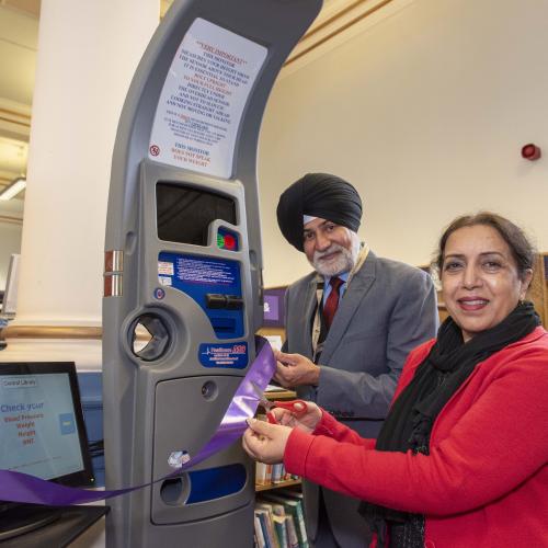 Launching the new health monitor at Central Library are Councillor Bhupinder Gakhal, the City of Wolverhampton Council's Cabinet Member for Visitor City, and Councillor Jasbir Jaspal, Cabinet Member for Adults and Wellbeing