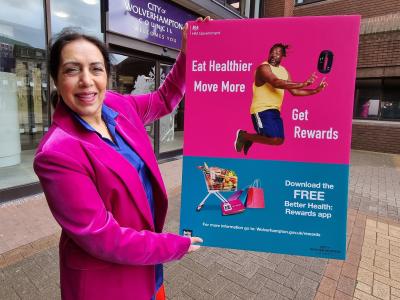 Councillor Jasbir Jaspal, the City of Wolverhampton Council's Cabinet Member for Public Health and Wellbeing, pictured at the Better Health: Rewards Bus which will be out and about over the coming weeks, is encouraging people to download the free Better Health: Rewards app