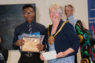 Winner of the Wolverhampton Young Citizen Award, Samuel Iyawe, receives his award from the Mayor of Wolverhampton, Councillor Claire Darke