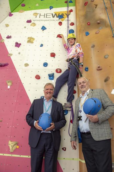 Councillor Ian Brookfield, right, Leader of the City of Wolverhampton Council, with The Way chairman John Gough and club member Faith Williams, who is scaling the centre’s popular climbing wall