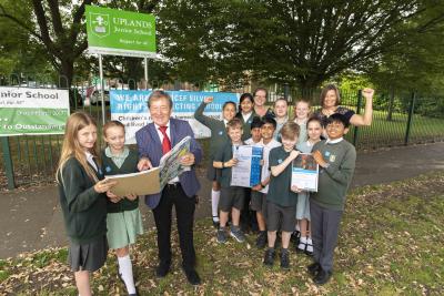 Uplands Junior School pupils with Councillor Dr Michael Hardacre, the City of Wolverhampton Council's Cabinet Member for Education and Skills, and, back left, Sarah Lane, Rights Reception Lead Teacher, and back right, Headteacher Suzanne Webster-Smith