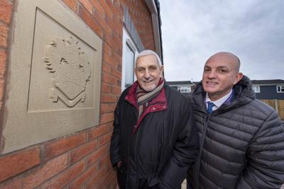 (l-r): Shaun Aldis, Wolverhampton Homes Chief Executive, and Councillor Peter Bilson, show off one of the commemorative stones in a new-build bungalow at Whiston Avenue, Ashmore Park. The bungalows were built on derelict land