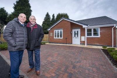 (l-r): Councillor Peter Bilson and Shaun Aldis, Wolverhampton Homes Chief Executive, outside the newly built council bungalow in Whiston Avenue, Ashmore Park