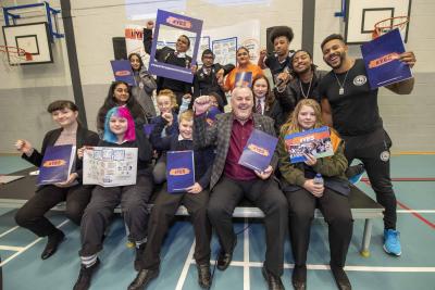 Leader of the City of Wolverhampton Council Councillor Ian Brookfield with Daryl Chambers and Neeco Chambers from InPower Academy, rapper Vital, Parent Champion Shashi Kambo and young people who helped shape the co-produced Youth Engagement Strategy