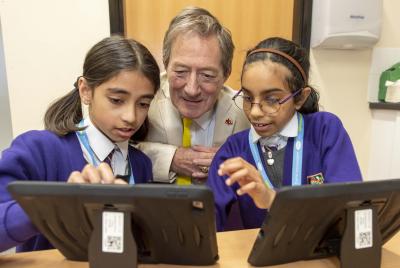 Councillor Dr Michael Hardacre, the City of Wolverhampton Council's Cabinet Member for Education and Skills joins pupils to find out how Lanesfield Primary School is using iPads to enhance learning