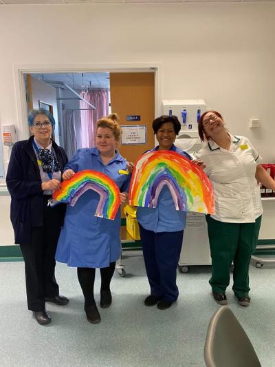 Creative pupils at Bushbury Hill Primary School have donated paintings of rainbows to Russells Hall Hospital, where former pupil Emma Redford is a nurse. She is pictured second left with colleagues Jackie Marsh, Felicitas Retiza and Sam Jones