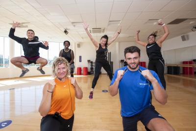 WV Active members and instructors are celebrating as it reopens its doors. Pictured are, front, WV Active instructors Rebecca Pearce and Josh Bell and class members Chad Rhodes, Taliba Sharpe, Den Gregory and Sutinder Herian