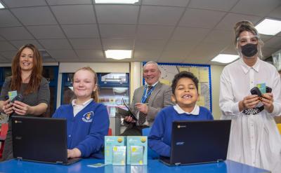 Bilston CE Primary School have been supported by the Council and pictured (LtoR) are Donna Robinson, Teacher and IT co-ordinator, Gary Gentle, Head Teacher, and Cllr Beverley Momenabadi, with pupils Summer Timmins, and Jayden Lauder