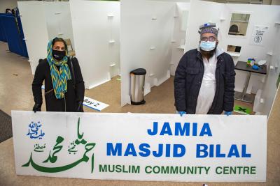 Councillor Jasbir Jaspal, the City of Wolverhampton Council's Cabinet Member for Public Health and Wellbeing, and Mohammed Shafiq at the Jamia Masjid Bilal which is offering rapid Covid-19 testing for people without symptoms of the virus