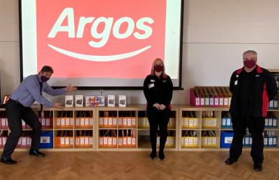 Left, Head of School Earl Richards, centre, parent Kelly Greatrex, who has a son in Year 1, and, right, Lee Broadbent, manager of Argos Bilston