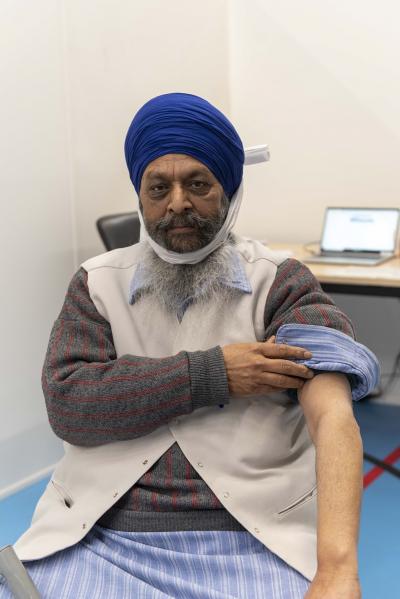 Surinder Singh, aged 67, prepares to receive his vaccine