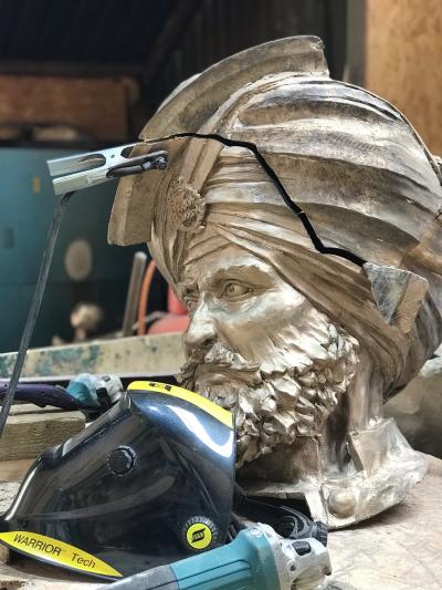 A head section of the figure of a Sikh soldier