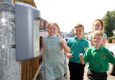 Fallings Park Primary School pupils Taylor-Sky Westwood, Caleb Blakemore, George Rowton and Layla Brain run towards a Beat Box