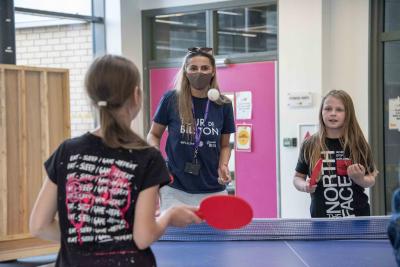 Councillor Beverley Momenabadi, the City of Wolverhampton Council's Cabinet Member for Children and Young People, joins a table tennis session with young members of The Way Youth Zone
