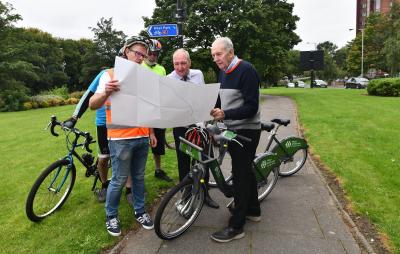 Members of the council’s transport team share plans for the city’s cycle routes with Hugh Porter MBE