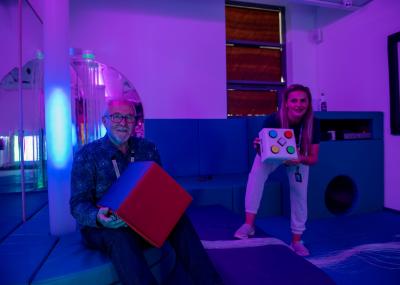 Councillor Beverley Momenabadi, Cabinet Member for Children and Young People, and Councillor Alan Butt, who supported the new sensory room through Ward Funds, check out the facility