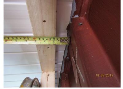 Gap left between studs and concrete wall. No insulation was provided behind the timber studs and inadequate space was left between the studs and the concrete wall