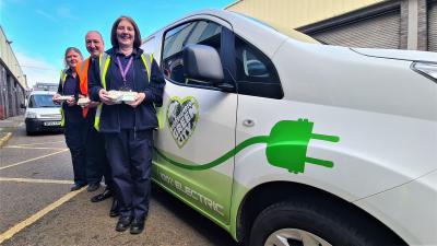 Front to back - With one of the new zero emission electric vans are Meals on Wheels delivery driver Debbie Gait, City of Wolverhampton Council's cabinet member for city environment and climate change Councillor Steve Evans and driver Jackie Kinsey