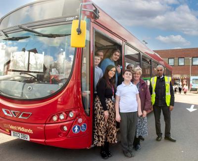 Pictured with staff and pupils from Tettenhall Wood School is the City of Wolverhampton Council's first Independent Travel Training Coordinator, Alistair Boddie, and bus driver Jaspal Singh