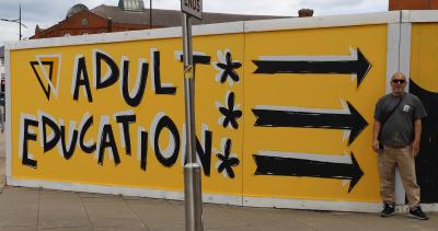 A street artist has signposted the way to Adult Education Wolverhampton's open day this weekend