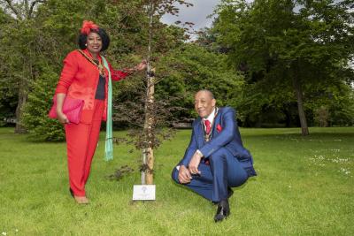 The Mayor of Wolverhampton, Councillor Sandra Samuels OBE, visited Bantock Park with her consort, husband Karl Samuels, to officially dedicate one of the thousands of new trees planted for the Queen’s Green Canopy (QGC)