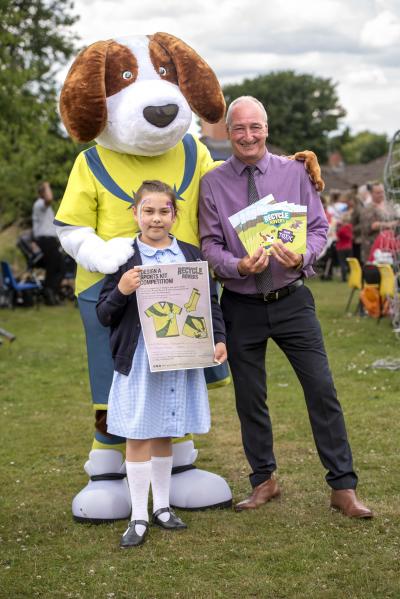 Rex Reuse meets competition winner Kirra Milana Narkunaite who designed the Recycle Rovers sports kit and Councillor Steve Evans, cabinet member for city environment and climate change