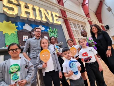 Pupils from Bantock Primary School join Councillor Chris Burden, the City of Wolverhampton Council’s Cabinet Member for Education, Skills and Work, and Headteacher Harvey Sarai to celebrate receiving the School Mental Health Award from Minds Ahead and the Carnegie Centre of Excellence for Mental Health in Schools
