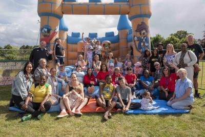City of Wolverhampton Council’s Fostering Social Work Team, foster carers and children enjoy a summer get together with the annual picnic in the park with bouncy castles