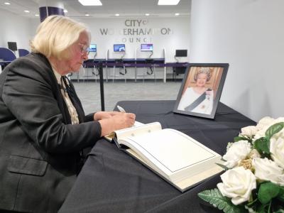 Pictured signing the Book of Condolence at the Civic Centre this morning is Leader of the Conservative Group, Councillor Wendy Thompson