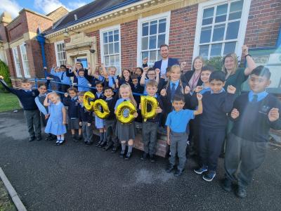 Pupils from Villiers Primary School celebrate their Good Ofsted success with Councillor Chris Burden, Cabinet Member for Education, Skills and Work, Lisa Rogers, Headteacher and Hayley Bentley, Deputy Headteacher