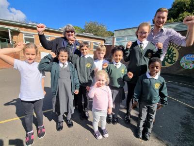 Pupils from Warstones Primary School celebrate their Good Ofsted success with Councillor Chris Burden, Cabinet Member for Education and Skills, and Fiona Feeney, Headteacher