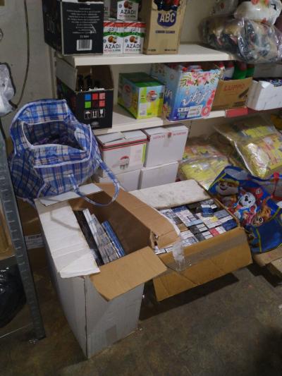 Boxes of illicit cigarettes seized from another city premises during raids by Trading Standard officers
