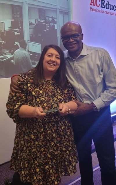 Low Hill Nursery Headteacher Natalie Showell with Kriss Akabusi MBE, who told delegates at the Attachment Research Community conference about his personal story of growing up within the care system
